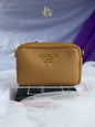 Prada camera bag mini caramel 158D crossbody guitar strap Brandnew