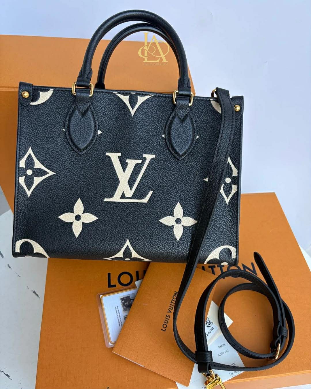 Louis Vuitton On the Go impriente pm Excellent Condition
