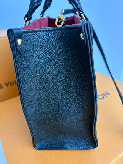 Louis Vuitton On the Go impriente pm Excellent Condition