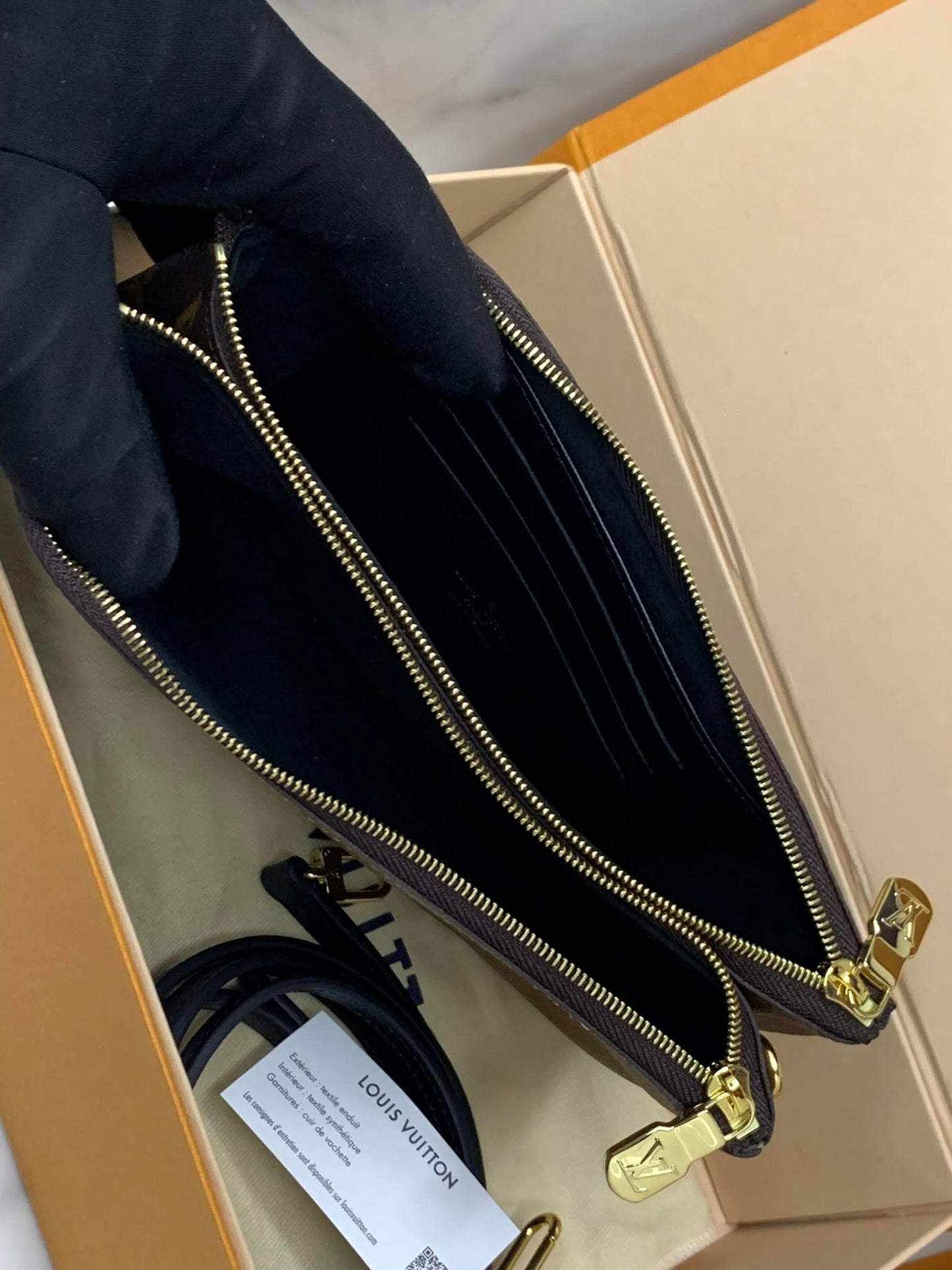 Louis Vuitton double zipreverse brand new