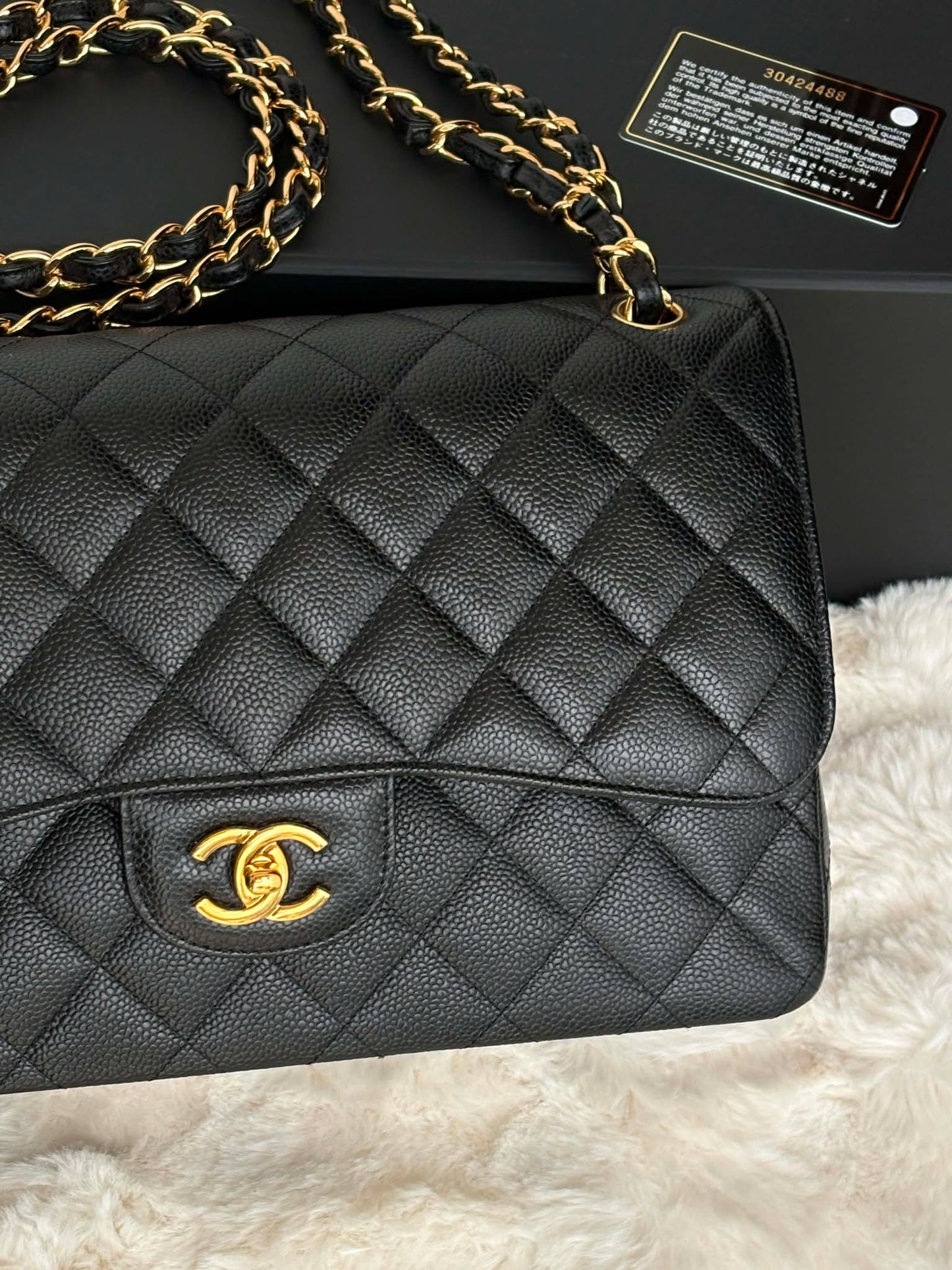 Chanel Large flap black caviar series 30424488 Rank SA