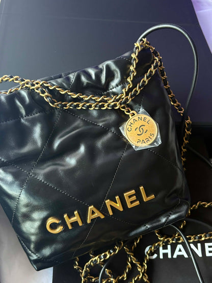 Chanel black mini hobo ghw BN