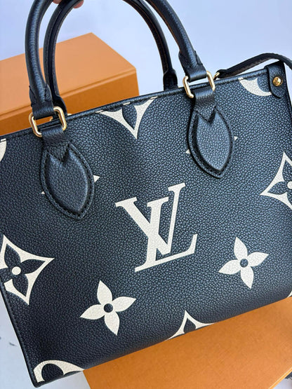 Louis Vuitton On the Go impriente pm Excellent Condition