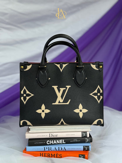 Louis Vuitton On the Go impriente pm Excellent Condition