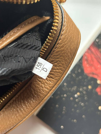 Prada camera bag mini caramel 158D crossbody guitar strap Brandnew